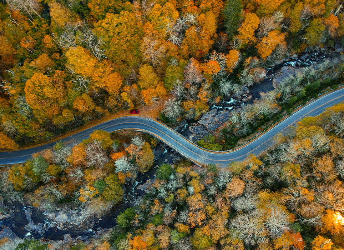 Henderson, NC - Aerial View of the Blue Ridge Parkway and a Curved Appalachian Mountain Road in North Carolina